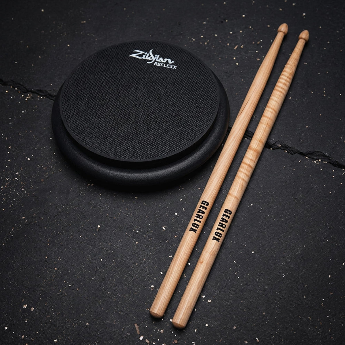 Zildjian ZXPPRCP10 10-Inch Reflexx Dual-Sided Conditioning Practice Pad w/ Drumsticks