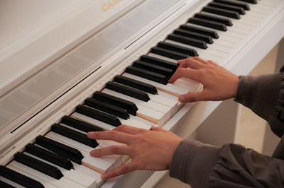 Casio AP-550 Celviano 88-Key Digital Piano - White w/ Headphones
