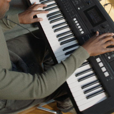 Yamaha PSR-E483 61-Key Touch-Sensitive Portable Keyboard